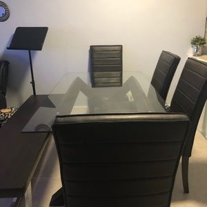 Table, 4 chairs, get a free bench with it.